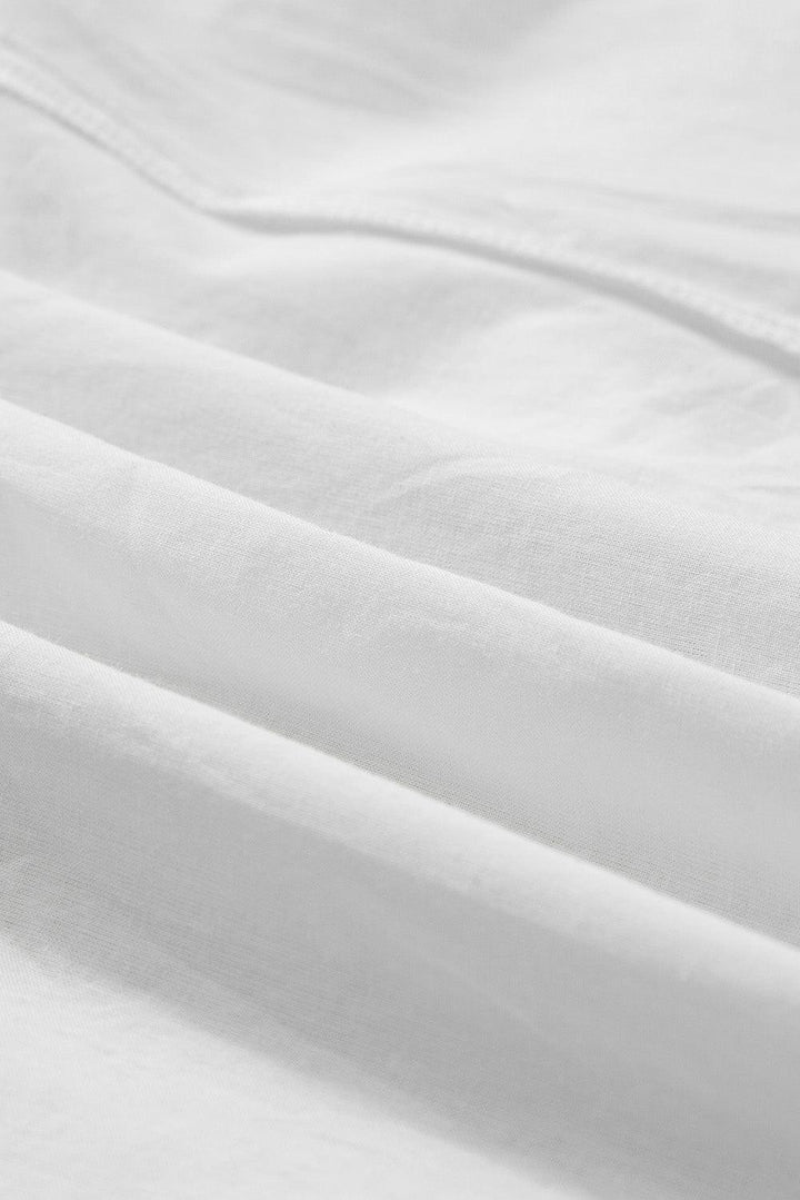 Robe Courte Pureté – Coupe Fluide & Broderie Blanche Romantique