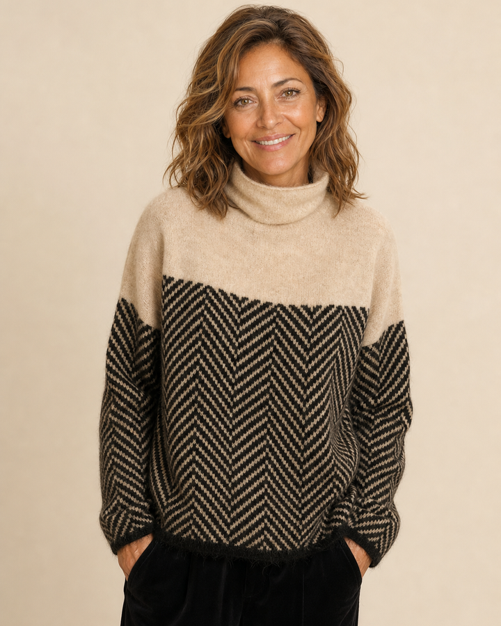 Pull bicolore à motif chevron